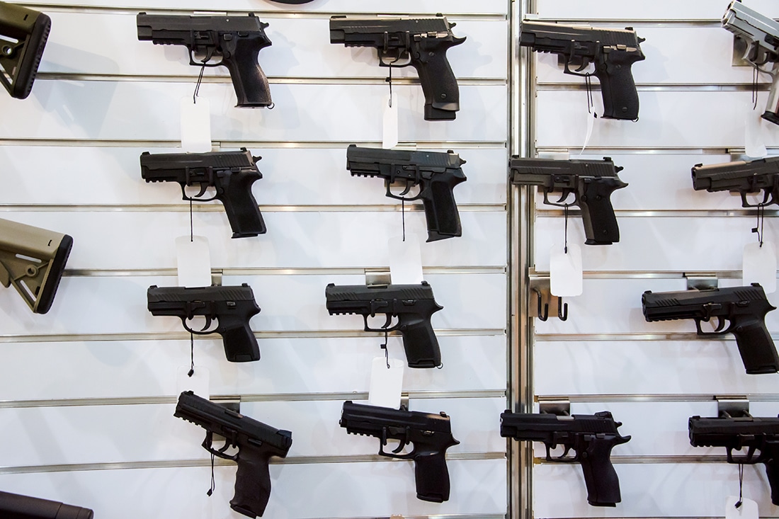 Pistols on Wall Rack at Gun Store